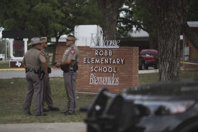 Texas state troopers outside Robb Elementary School in Uvalde, Texas, on May 24, 2022.