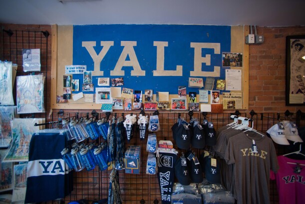 Views Of Yale University As Ivy League Pay Soars
Branded items are displayed for sale at the Campus Customs store near the Yale University campus in New Haven, Connecticut, U.S., on Friday, June 12, 2015. Yale University is an educational institute that offers undergraduate degree programs in art, law, engineering, medicine, and nursing as well as graduate level programs.