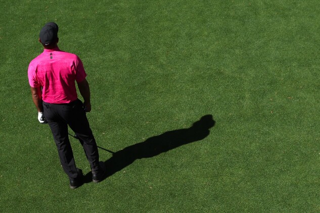 Tiger Woods lines up a shot from the 18th tee during the first round of the Masters at Augusta National Golf Club on April 07, 2022 in Augusta, Georgia.