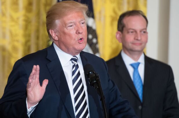 President Trump speaks alongside Labor Secretary Alexander Acosta on May 2, 2018. DOL Chief of Staff Nicholas Geale is leaving the department at the end of May 2019, following a White House probe into allegations that Geale mistreated staff and misled the administration on agency progress.