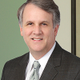 Mark E. Matthews