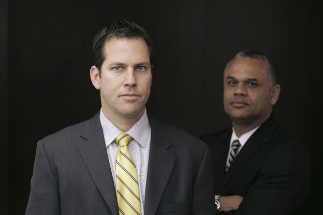 Lawyer Jordan Thomas (R) is pictured with one of his whistle blower clients, former Deutsche Bank financial analyst Eric Ben-Artzi, who publicly refused an $8 million award from the Securities and Exchange Commission for exposing improper accounting.