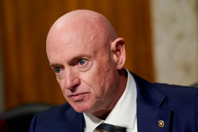 Arizona Democrat Mark Kelly, shown during a Senate Armed Services Committee hearing on Jan. 14, raises concerns about maintaining military readiness.