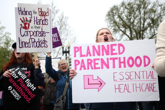 Abortion rights advocates demonstrate outside the US Supreme Court on April 2 as oral arguments are delivered in the case of South Carolina's attempt to exclude Planned Parenthood from Medicaid.  Separately, states face losing federal Title X money for abortion care. 