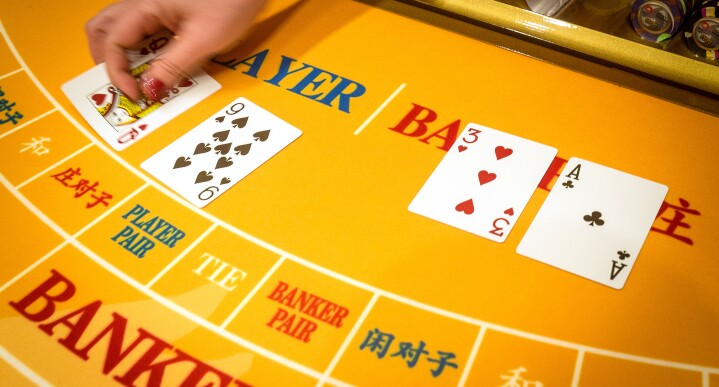 A dealer works at a game table inside a Las Vegas, Nev. casino.
