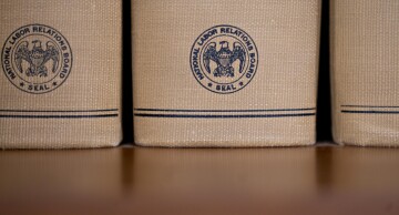 The National Labor Relations Board seal is displayed on decisions and orders volumes at the headquarters in Washington, on Monday, Sept. 30, 2019.