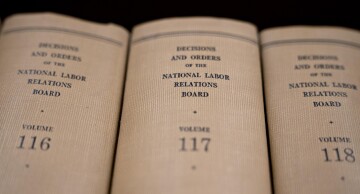 National Labor Relations Board decisions and orders volumes sit on a shelf at the headquarters in Washington, on Sept. 30, 2019.