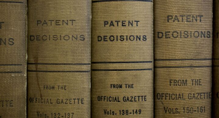 Photo of bound volumes of patent decisions.
