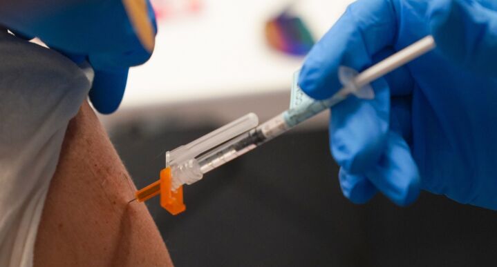 Photo of the Covid-19 vaccine being administered.