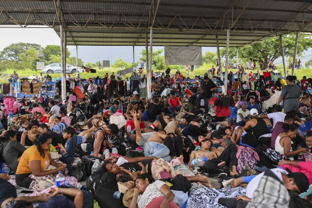 Migrants, mostly from Central America and Venezuela, on their way to the US, rest July 24 on the outskirts of Huixtla, State of Chiapas, Mexico. 