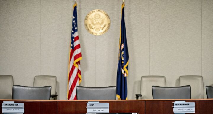Chairs sit inside the Equal Employment Opportunity Commission hearing room at the headquarters in Washington, on Feb. 18, 2020.