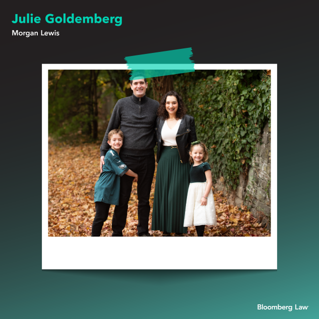 Julie Goldemberg of Morgan Lewis, her husband,  Daniel, and their two children wearing their Philadelphia Eagles green to cheer on their son's favorite football team.