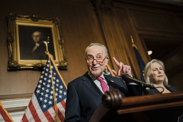 Schumer  flanked by Gillibrand speaks during a news conference on Feb. 10 in Washington, DC.