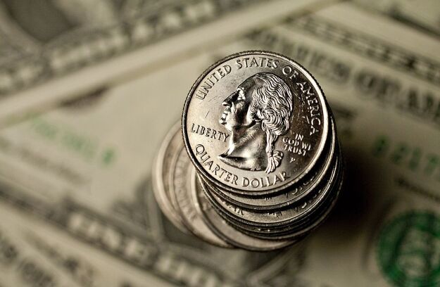 U.S. quarters and dollar bills.