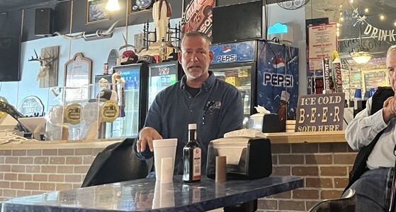 Senate candidate Dan Osborn (I-Neb.) shown speaking in Sly's Family Bar and Grill in Neligh, Neb. on Oct. 14.