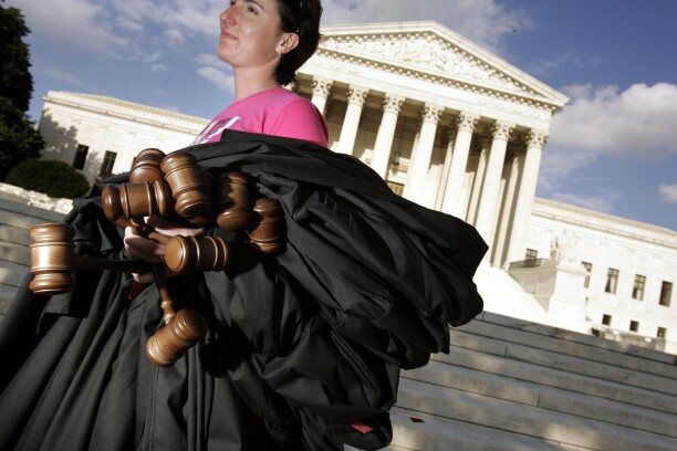 Judges' gavels and robes are seen.