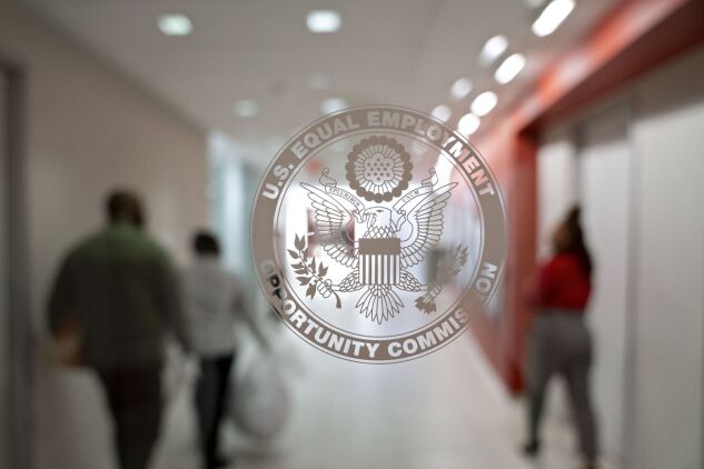 The EEOC seal is displayed on a window at the headquarters in Washington, D.C., on Feb. 18, 2020.