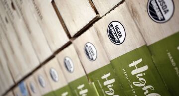 A United States Department of Agriculture (USDA) Organic badge is seen on boxes of mushrooms for sale.