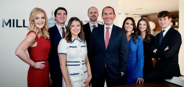 Founder Jeff Miller poses with staff members of his lobbying firm. From left: Ashley Gunn, Steve Ruppel, Annie Buckner, Jonathan Hiler, Miller, Jessica Mandel, Chloe Judge, and George Caram.