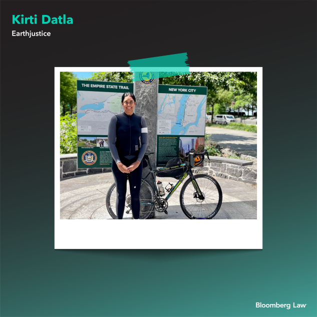Kirti Datla of Earthjustice Datla at the southern end of the Empire State Trail, after completing a 580-mile ride from Buffalo to New York City.