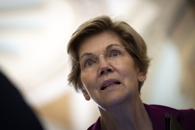 Sen. Elizabeth Warren, pictured at the Capitol on June 22, 2021, is pressing the Biden administration to forgive as much as $50,000 of a borrower's college loans. 