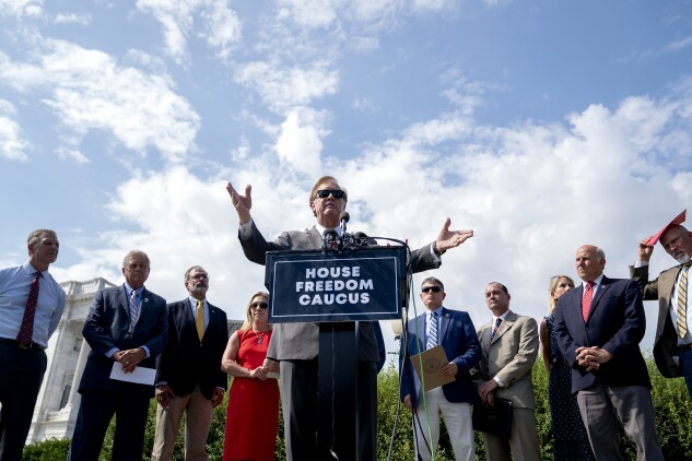Rep. Randy Weber (R-Texas) speaks with other members of the House Freedom Caucus outside the US Capitol.