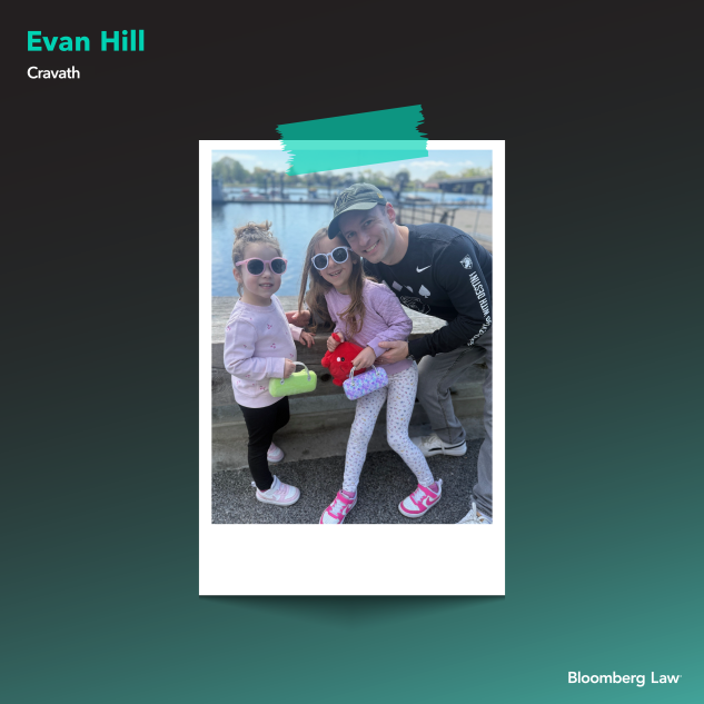 Evan Hill of Cravath and his daughters on a spring day walking The Wharf in Washington, DC.